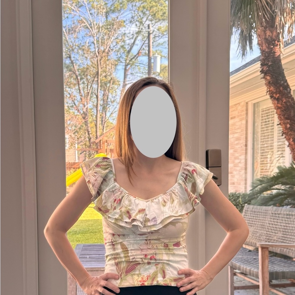 A blouse with soft, floral print with pastel tones, ruffled neckline. - Picture 3 of 5